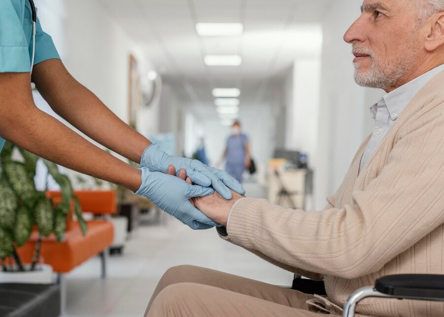 close up health worker helping patient